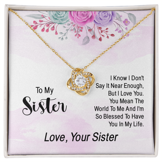 Love Knot necklace for a sister with a heartfelt "I know I don't say it enough" message card and floral design.