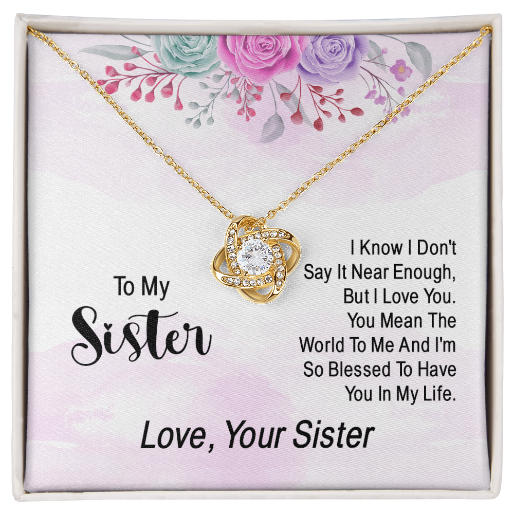 Love Knot necklace for a sister with a heartfelt "I know I don't say it enough" message card and floral design.